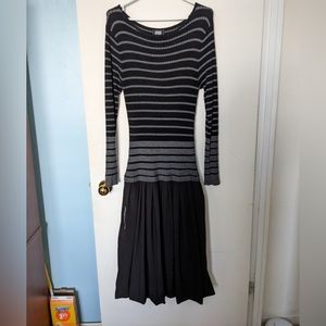 Uptown girl black dress layered in the bottom two pocket with zipper